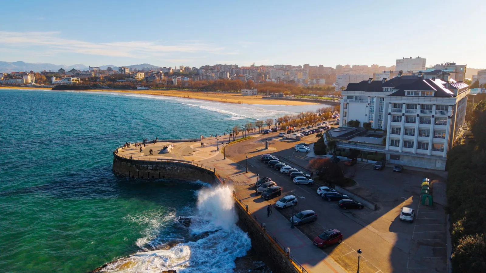 Urban view of Santander with bay, waterfront buildings, and coastal area in the background
