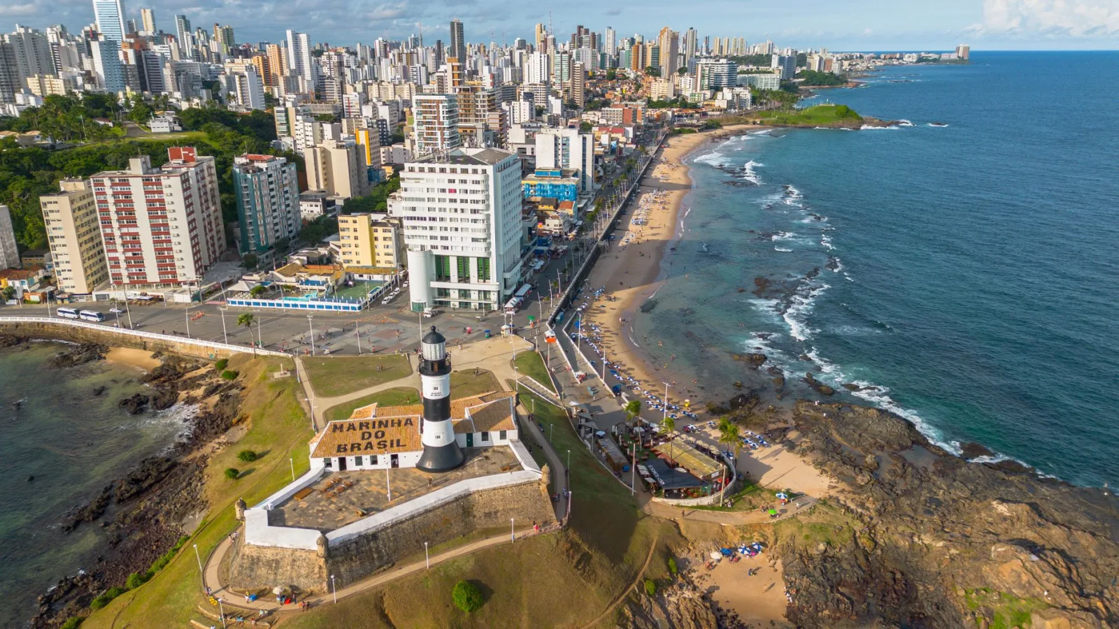 Panoramic view of Salvador with the Barra Lighthouse and seaside buildings.