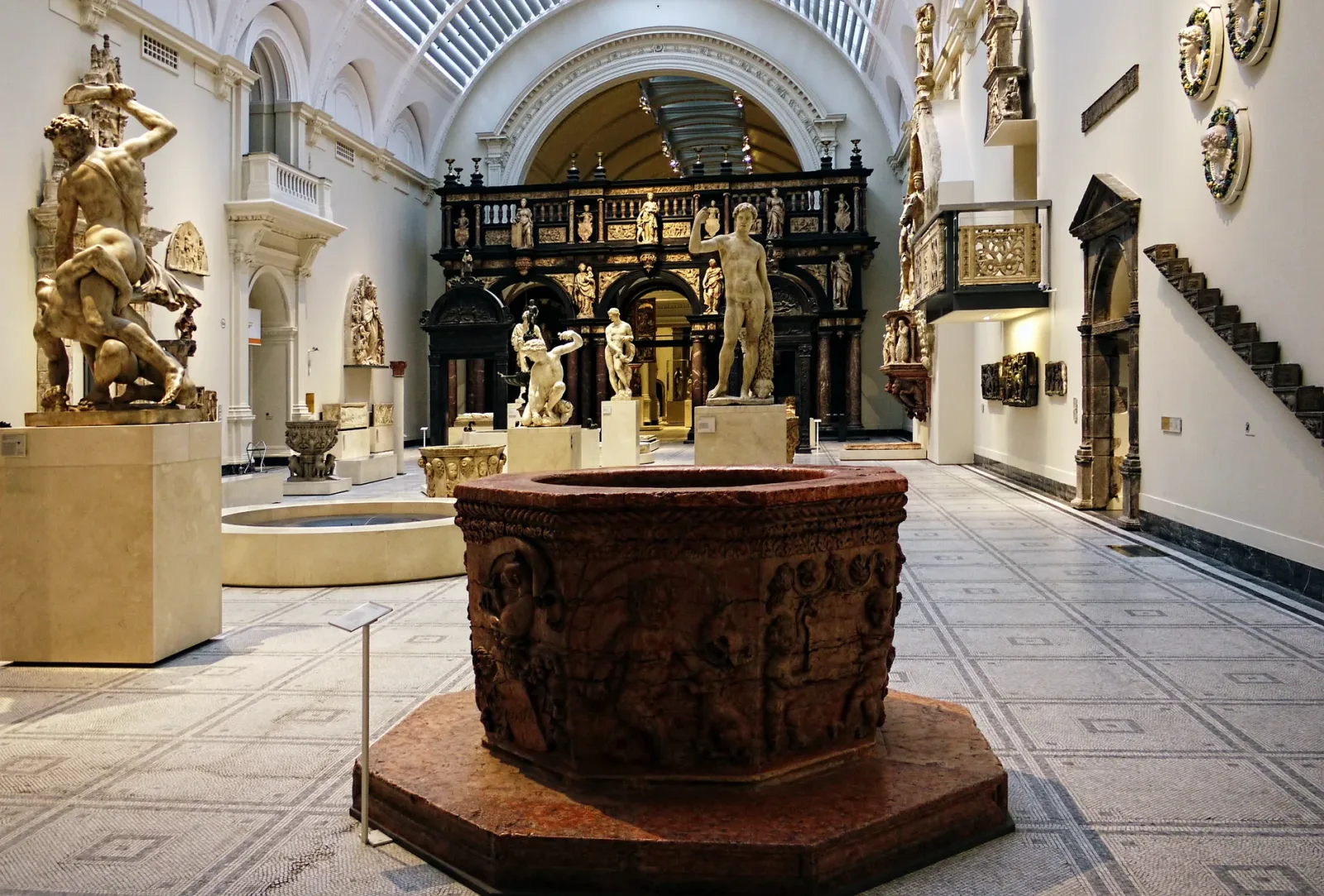 Inside the British Museum with visitors enjoying artworks and cultural programming in London