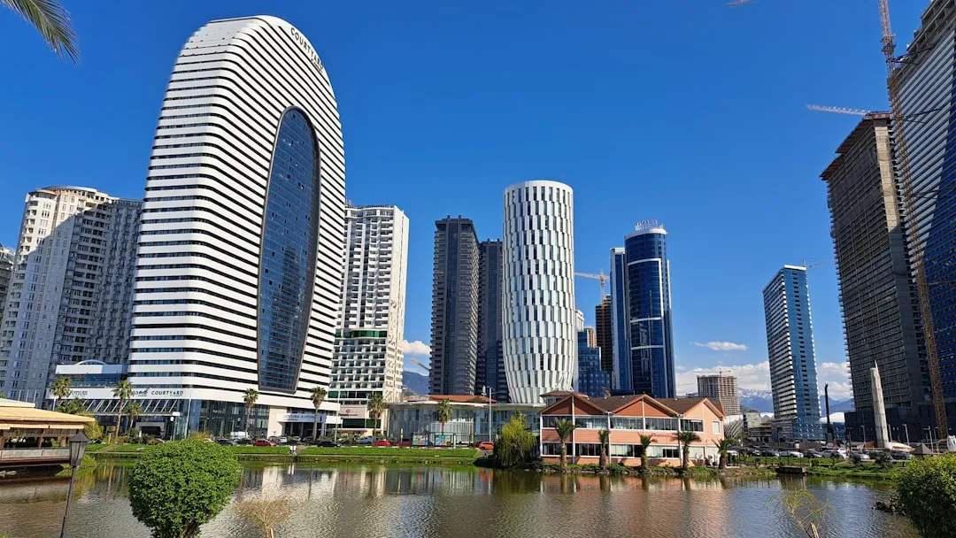 Batumi Seafront with modern buildings and the Black Sea coast in the background.
