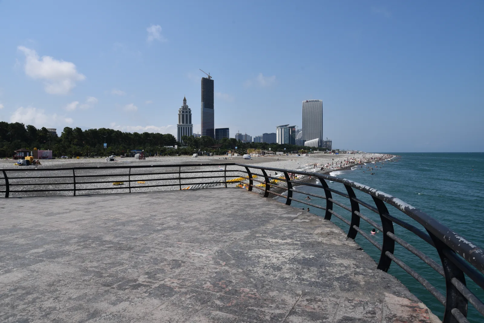 Urban view of Batumi with modern buildings and the Black Sea coast in the background
