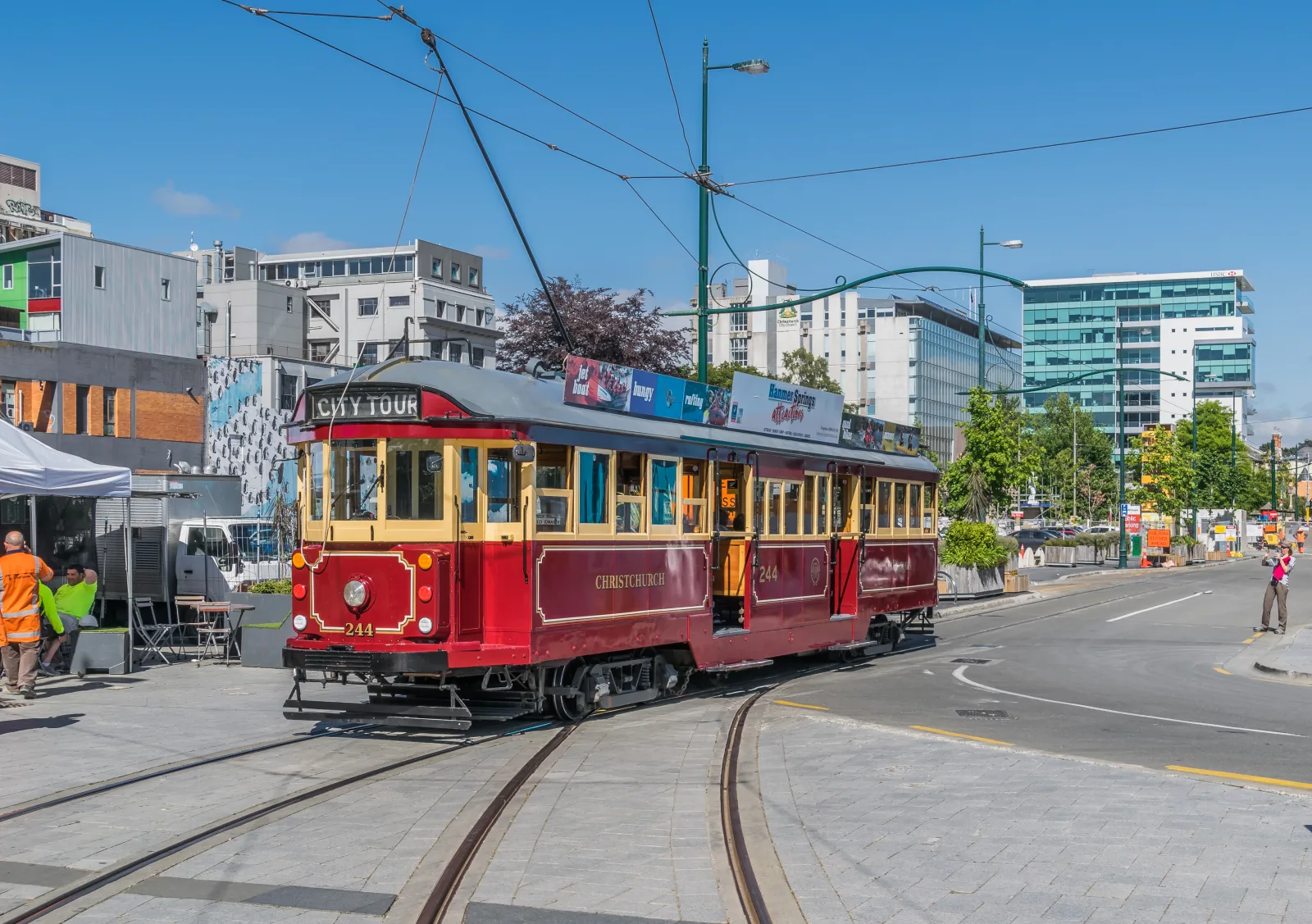 Urban view of Christchurch with low-rise buildings and green areas under an open sky