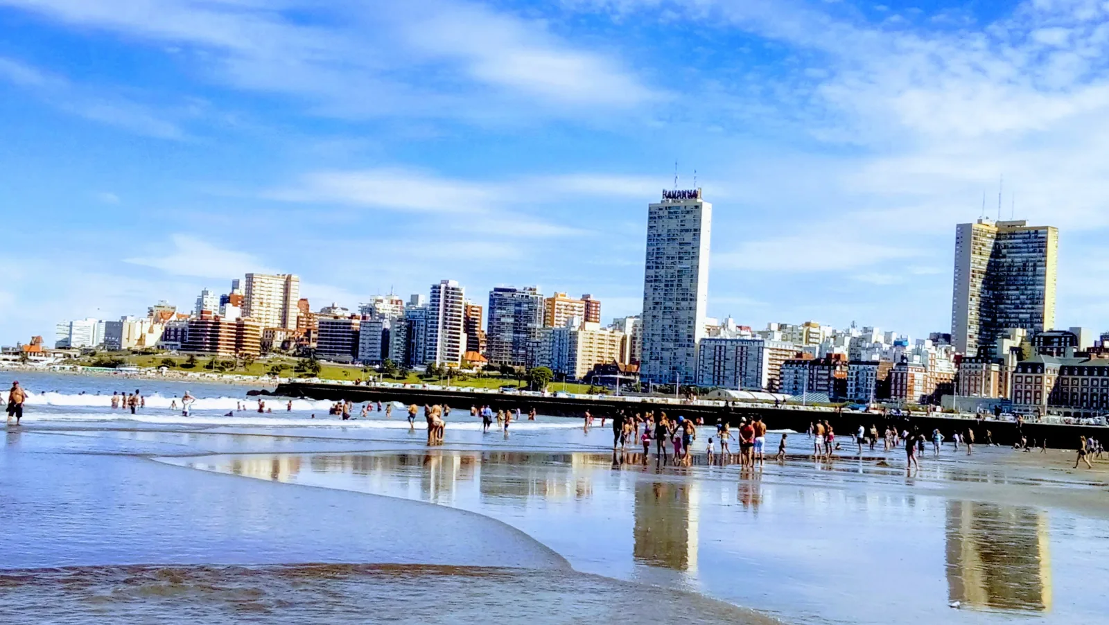 Beach and sea of Mar del Plata with seaside buildings in the background