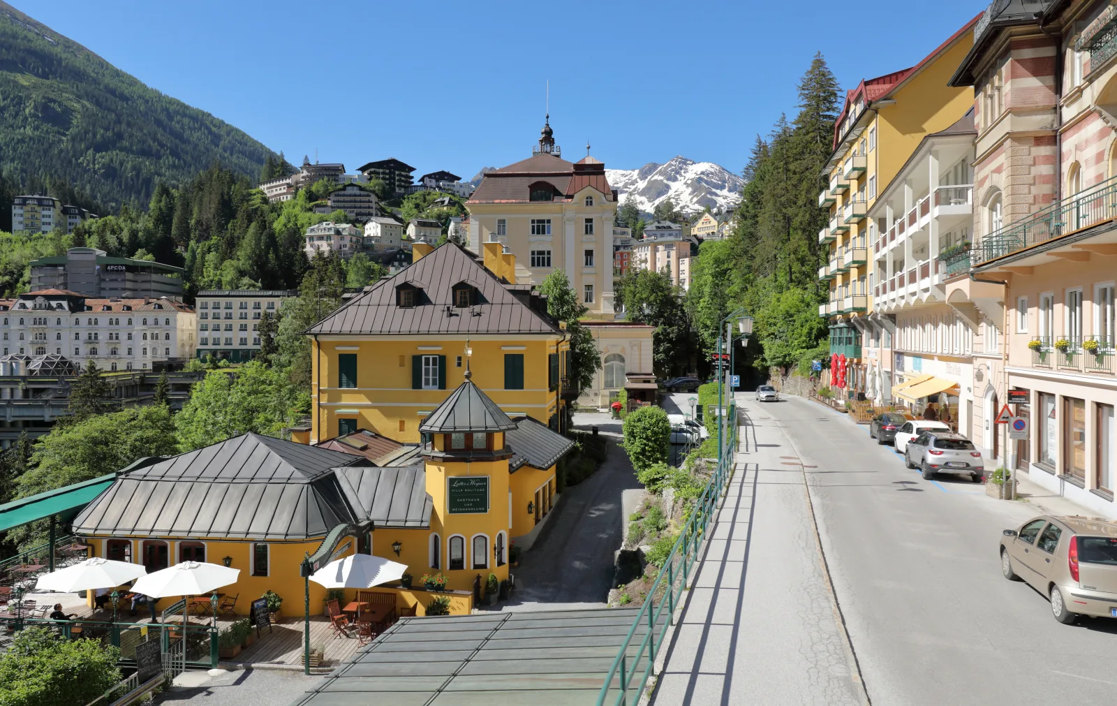 Alpine view of Bad Gastein in the Gastein Valley, surrounded by mountains and houses in the gorge.