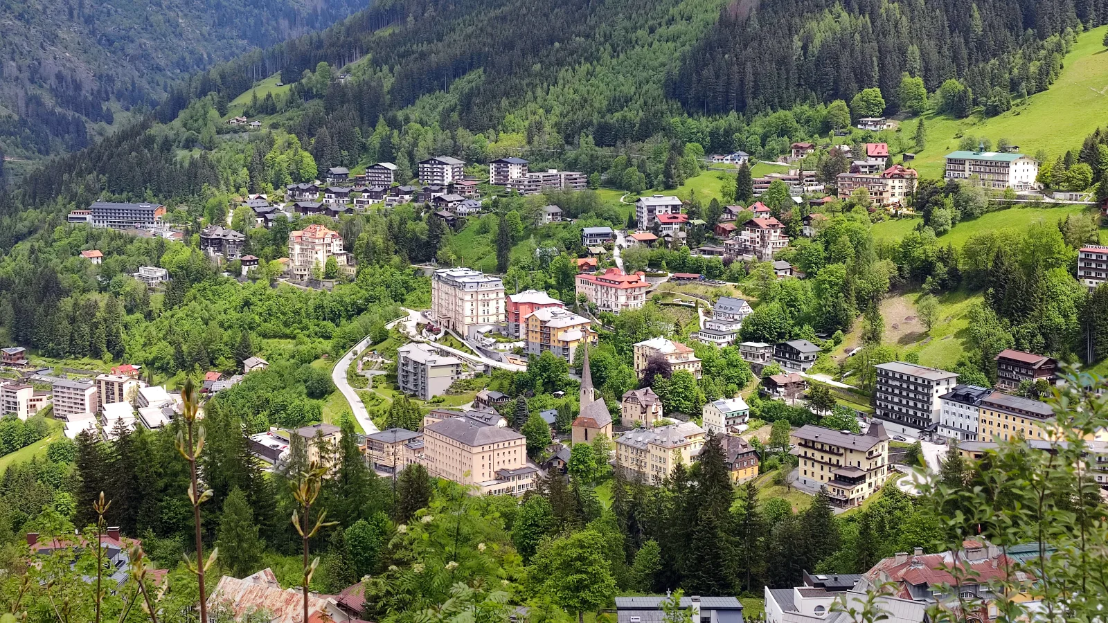 Bad Gastein covered in snow in winter, with alpine scenery and more expensive accommodation on New Year’s Eve