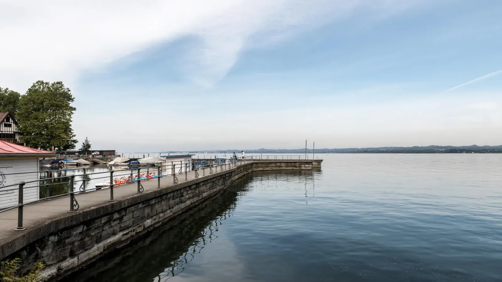 View of Bregenz on the shores of Lake Constance, with mountains in the background.