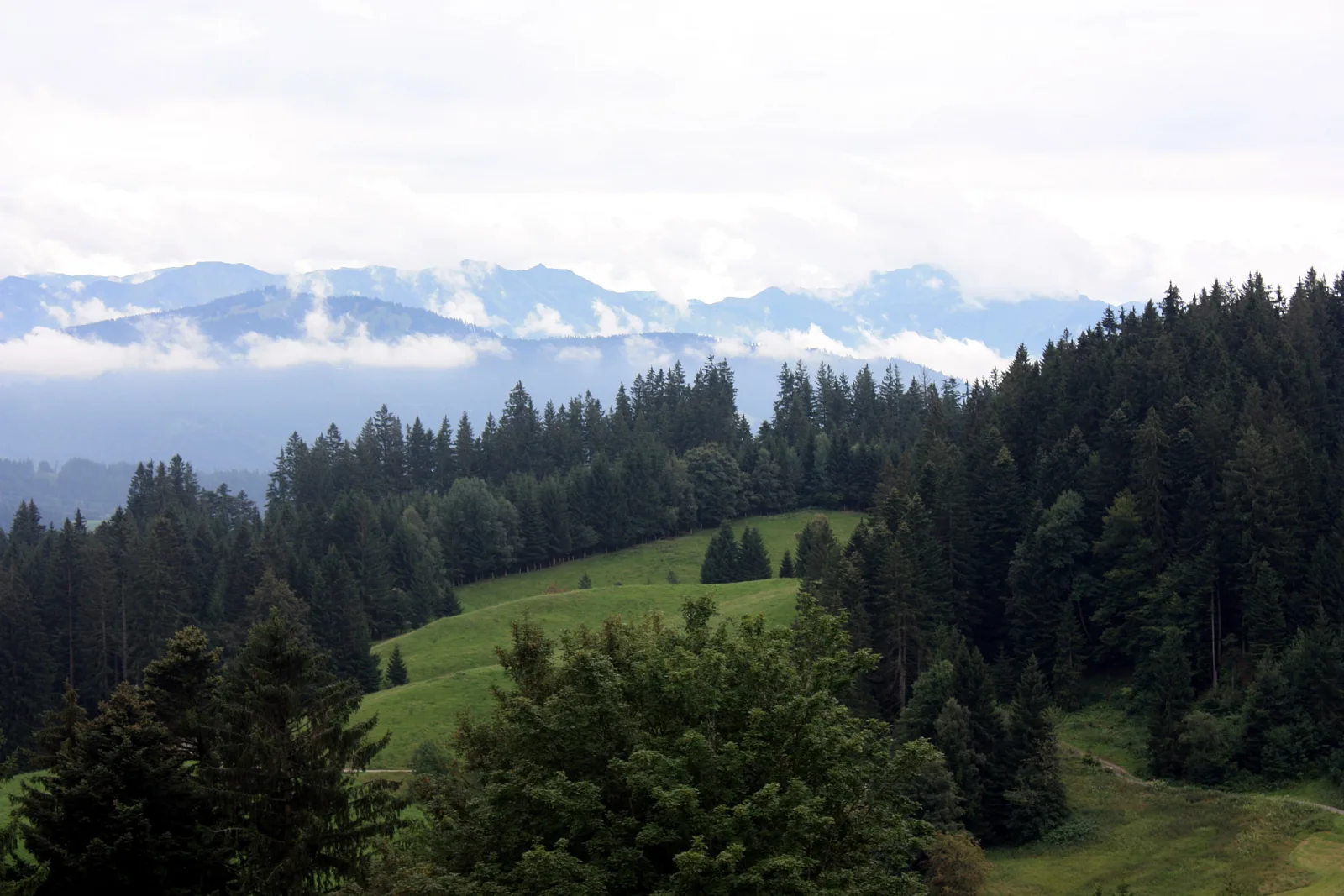 Panoramic view of Pfänder, with an alpine lookout and mountains in the background in Bregenz.