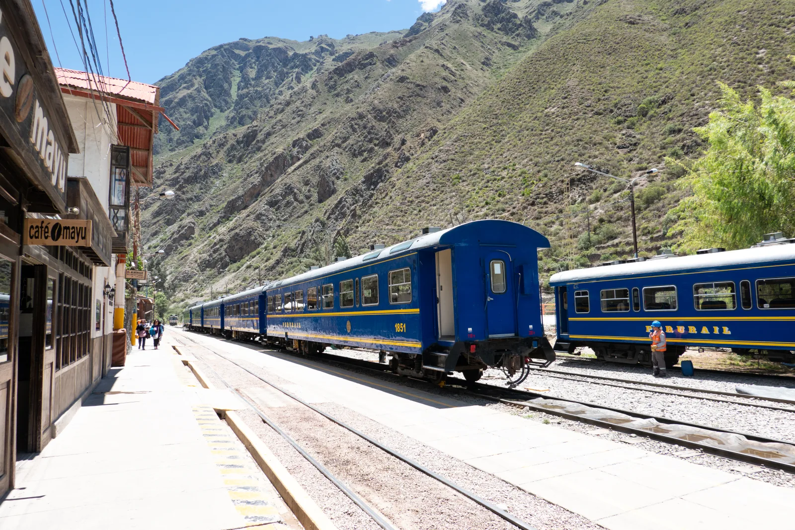 View of Ollantaytambo with stone streets and mountains in the background