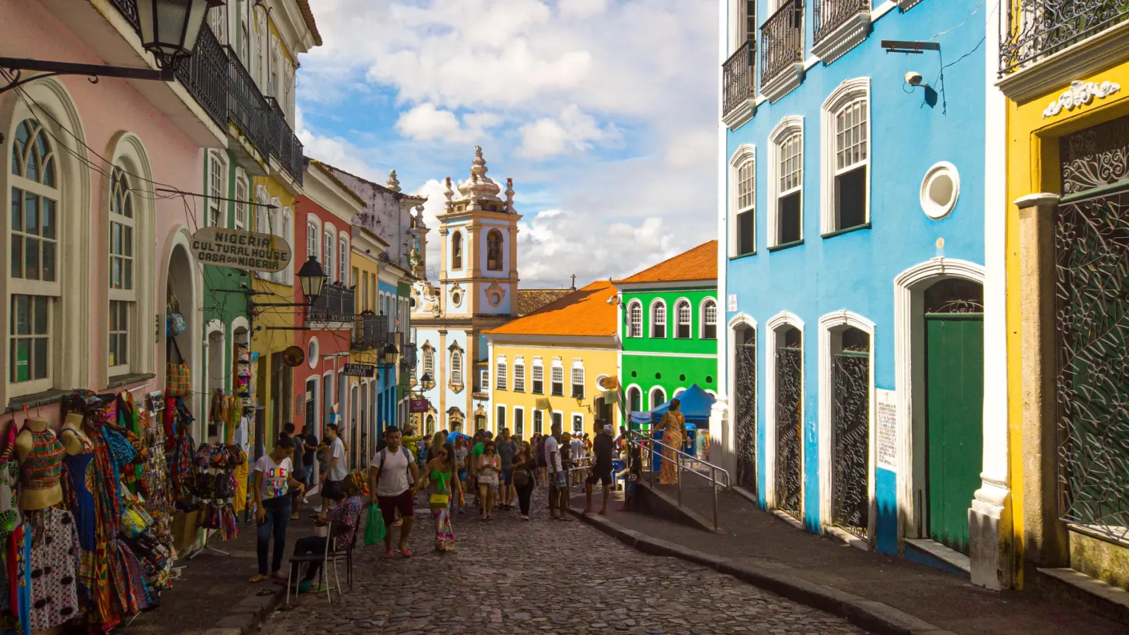 Walk through Pelourinho, with colorful mansions, historic churches, and cobblestone streets.