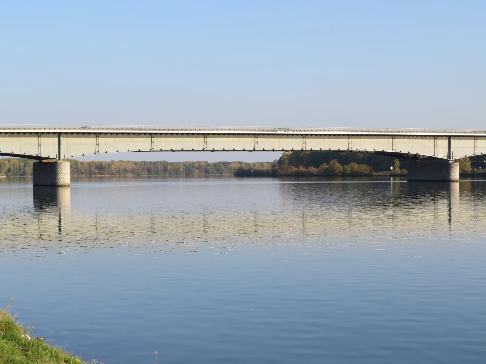 Trail among vineyards with a view of the Danube and the hills of Krems an der Donau